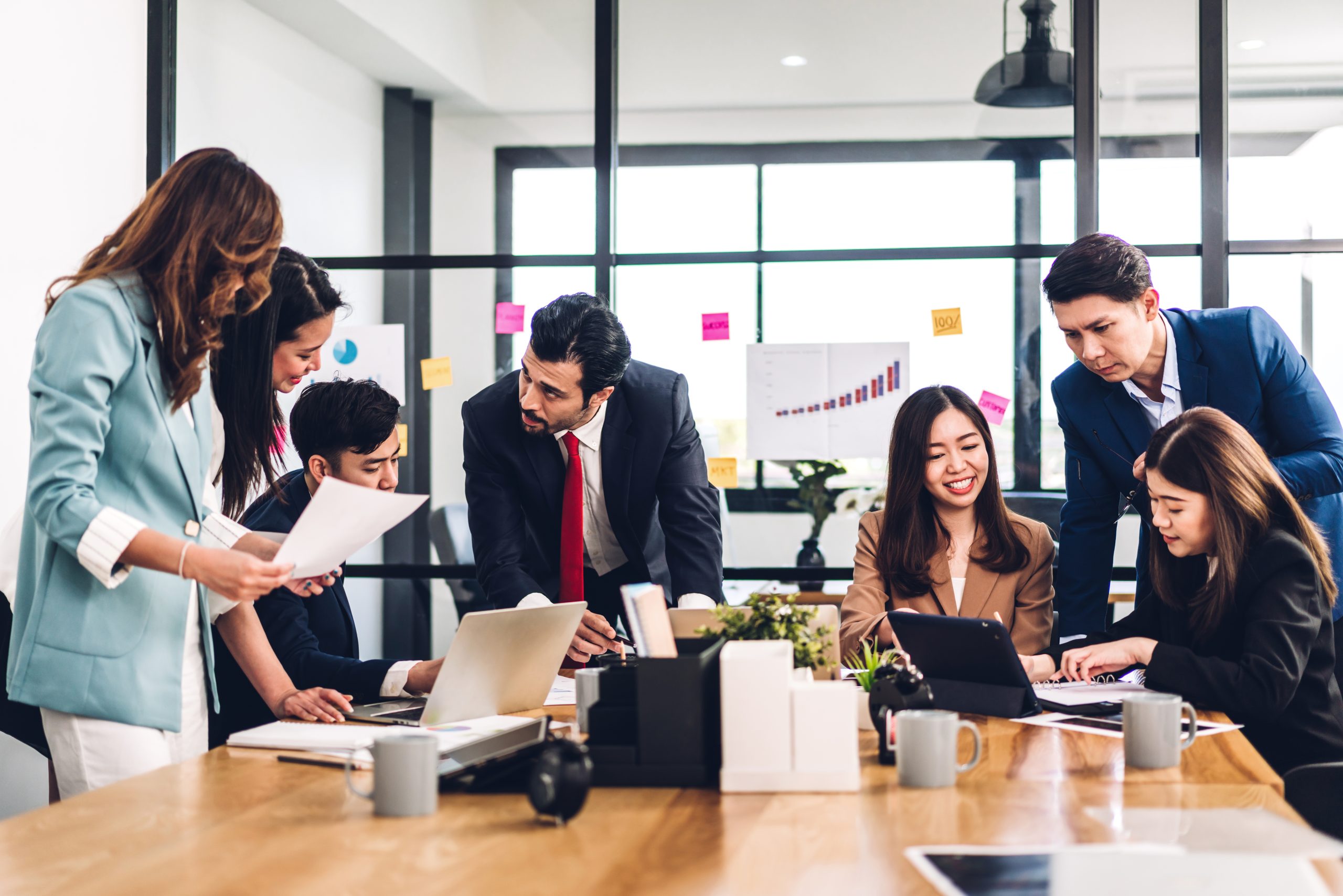 group of professional asian business meeting and discussing stra