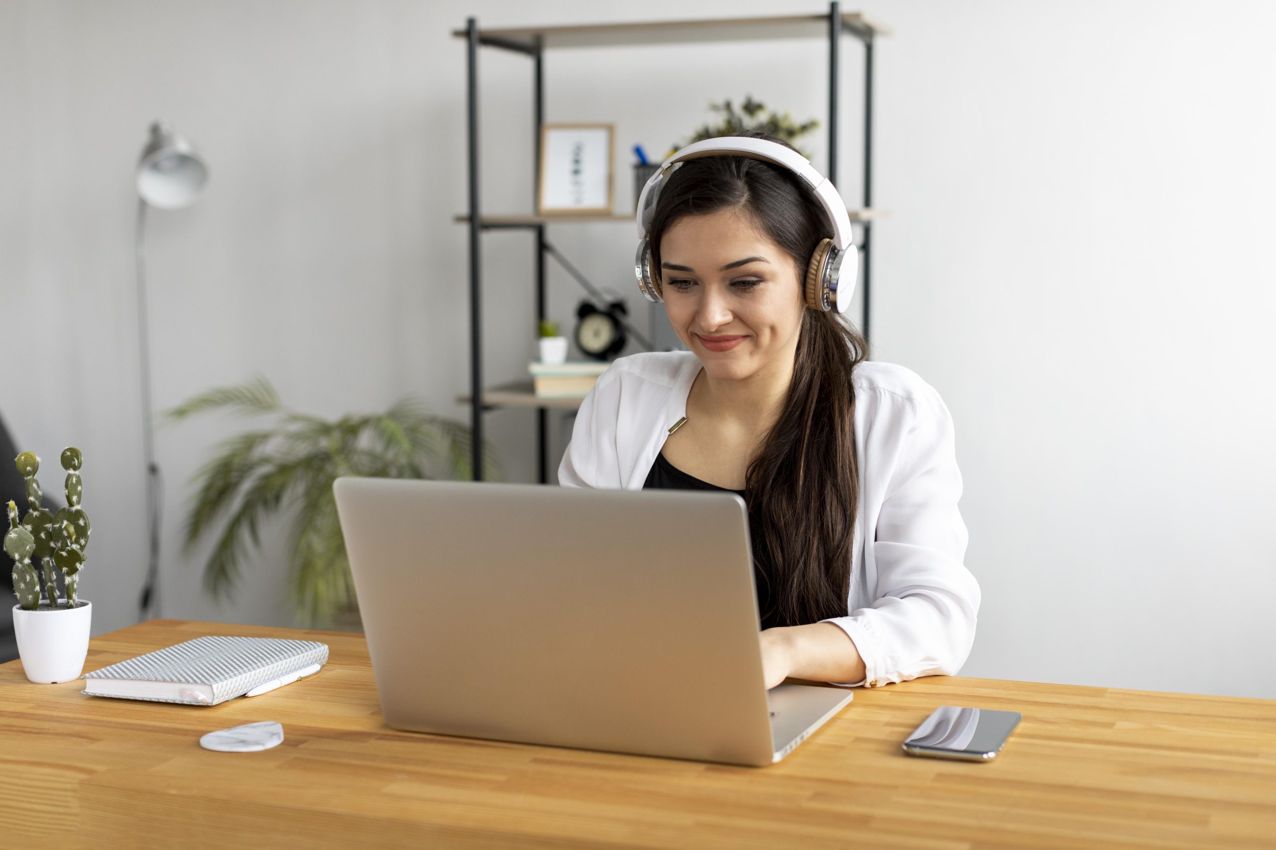 medium shot smiley woman typing